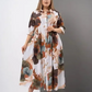 ⏳Nyári kiárusítás: 40%-os kedvezmény🔥【2XL-4XL】🌺Női laza hajtókás nyomtatott gomb-down hosszú ruha👗