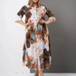 ⏳Nyári kiárusítás: 40%-os kedvezmény🔥【2XL-4XL】🌺Női laza hajtókás nyomtatott gomb-down hosszú ruha👗