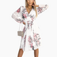 👗✨ Női Fehér Virágos V-nyakú Ruha Övvel 🌸